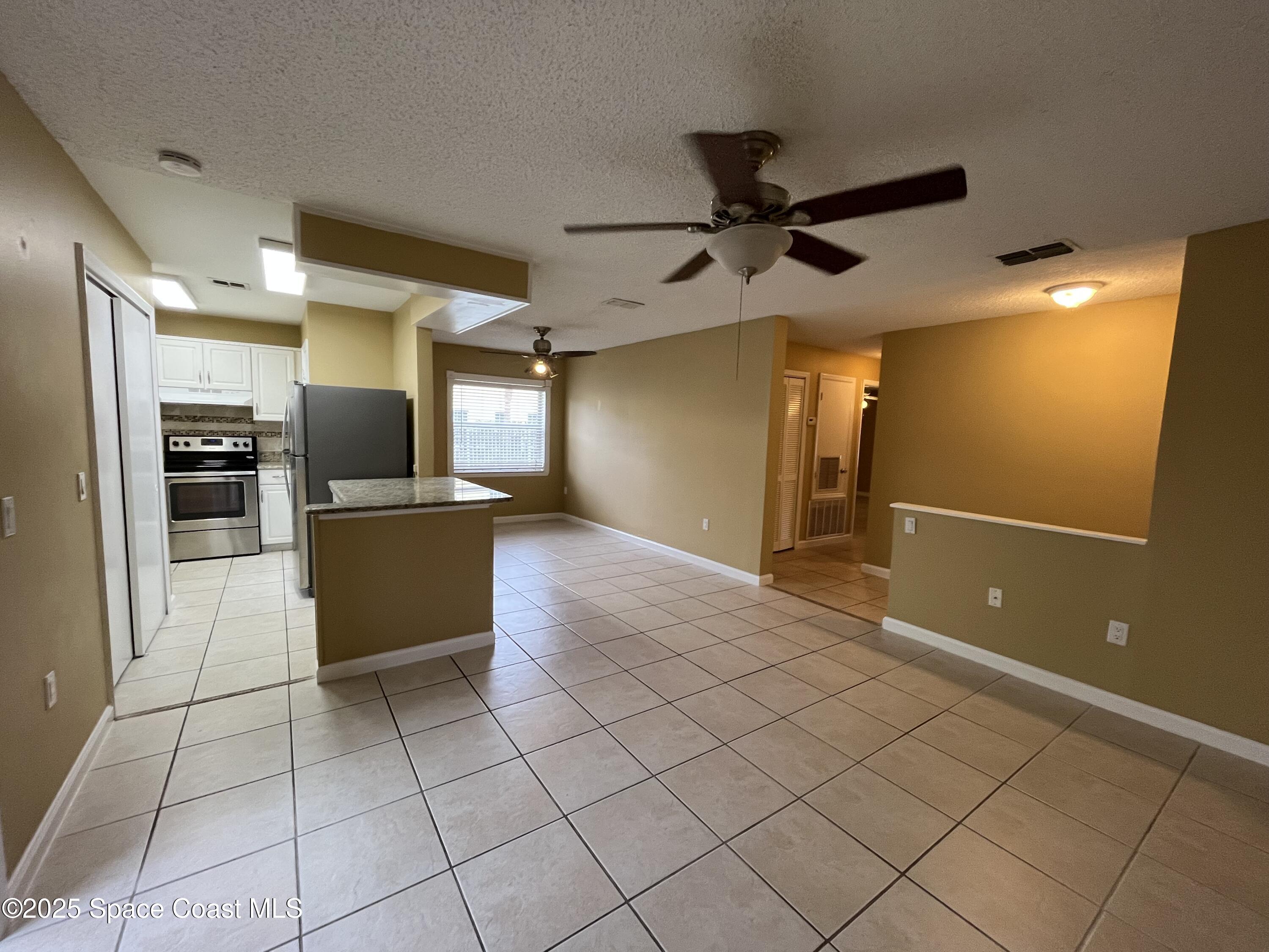 275 Spring Drive, Unit 6 Merritt Island, FL 32953 - Photo 6 of 16 Spring Dr 3