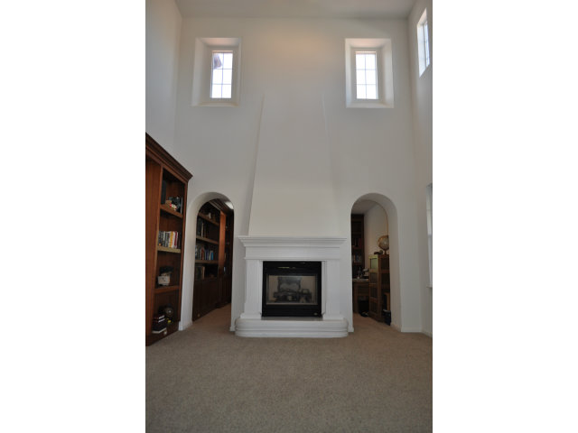 6560 Eagle Ridge Court Gilroy, CA 95020 - Photo 9 of 18 a view of an empty room with a fireplace and a window