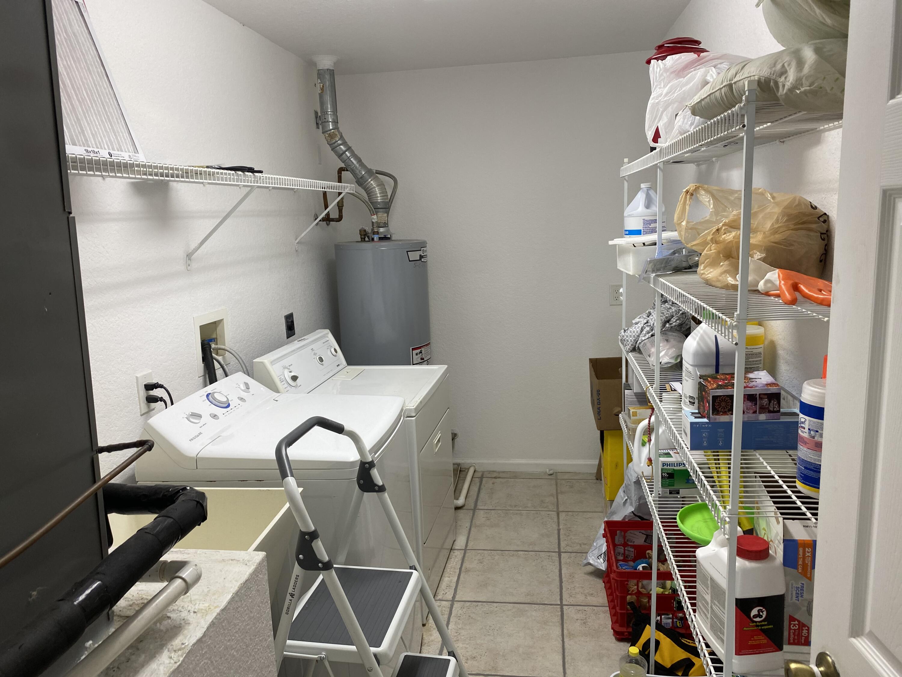 5425 Koblegard Road Fort Pierce, FL 34951 - Photo 15 of 33 a view of storage and utility room