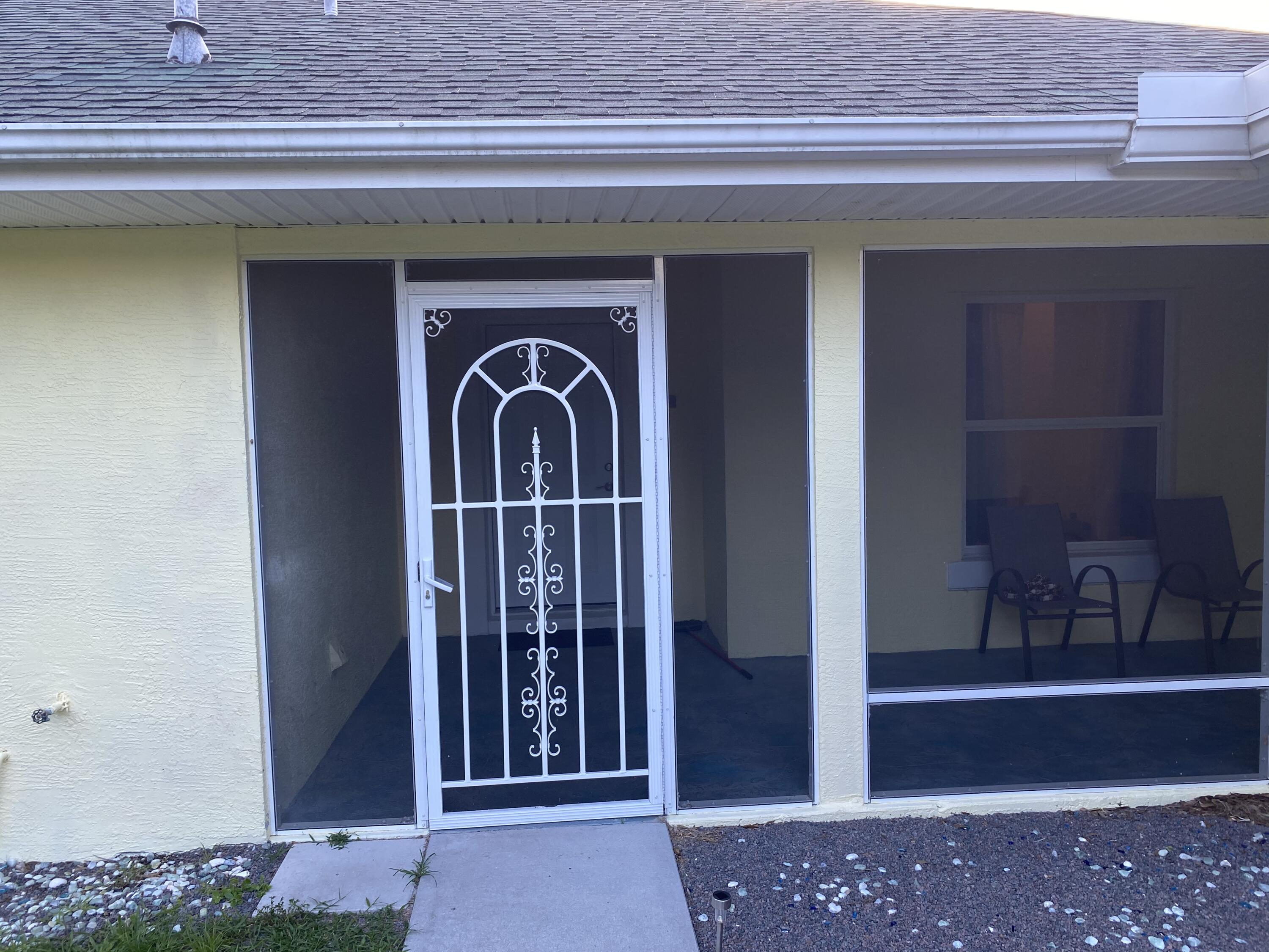 5425 Koblegard Road Fort Pierce, FL 34951 - Photo 6 of 33 a front view of a house