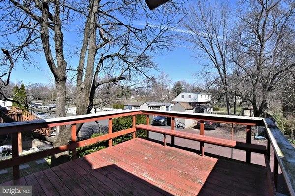 a view of a chairs with table in the balcony
