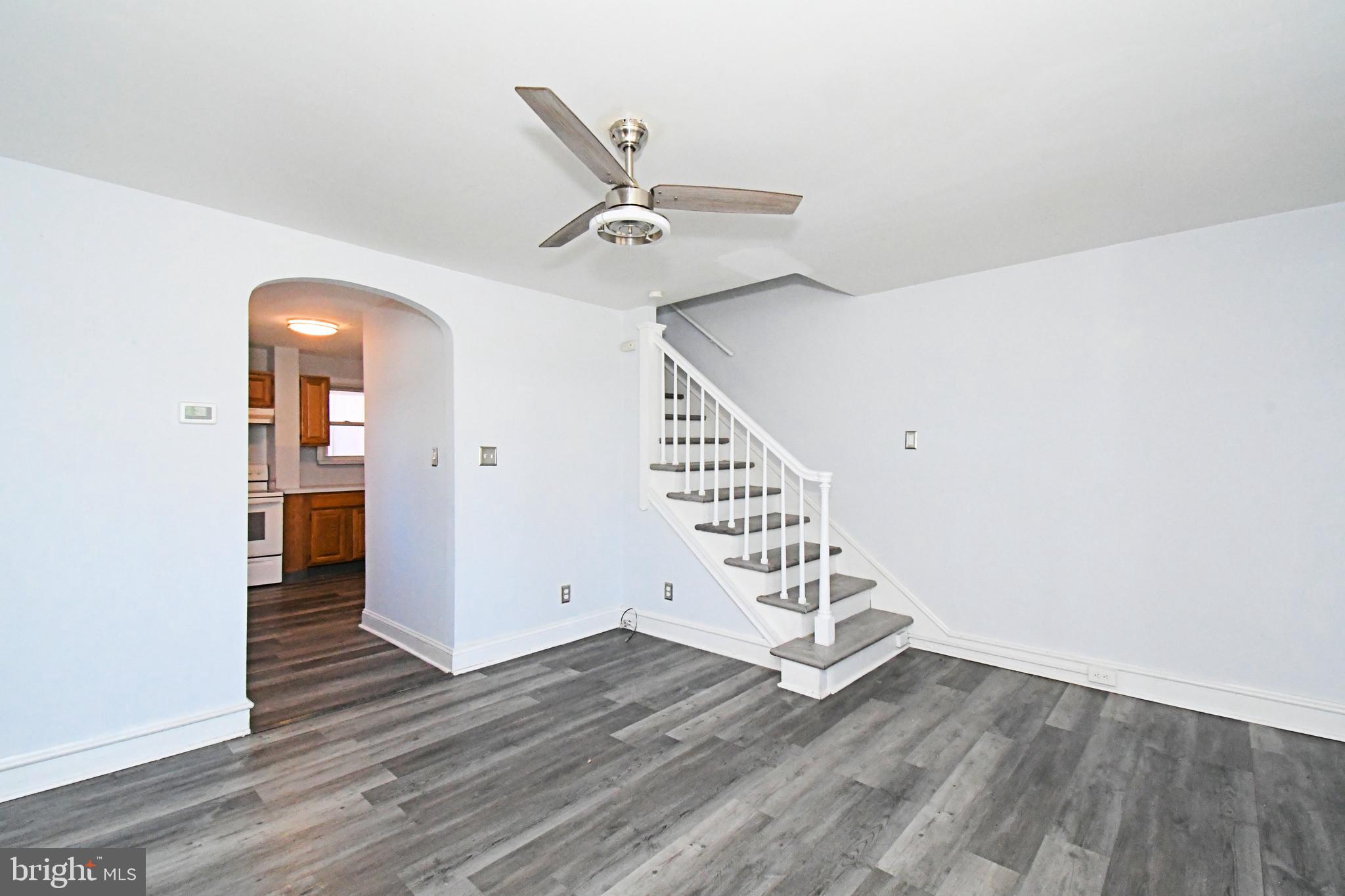 2721 Cowpath Road Hatfield, PA 19440 - Photo 3 of 29 an empty room with wooden floor white walls and windows