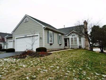 2618 Miller Road Geneva, IL 60134 - Photo 1 of 16 a front view of a house with a yard