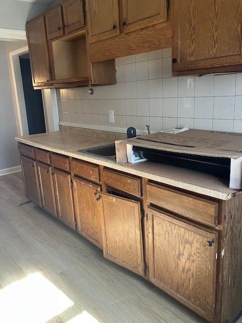 17821 Roy Street Lansing, IL 60438 - Photo 4 of 17 a kitchen with stainless steel appliances granite countertop a sink a stove and cabinets