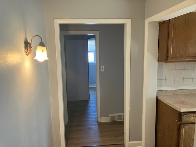 17821 Roy Street Lansing, IL 60438 - Photo 8 of 17 a view of empty room with wooden floor