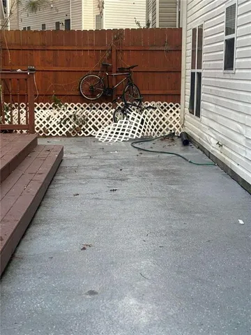 a view of a wooden fence