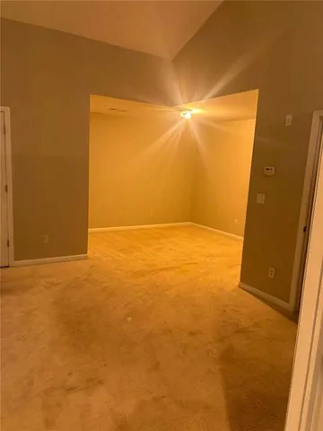 an empty room with a door