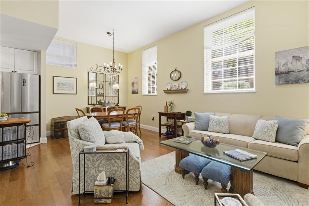 65 Glen Road, Unit H1 Brookline, MA 02445 - Photo 10 of 39 a living room with furniture and a large window