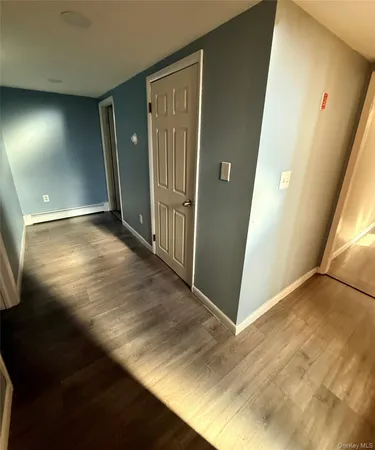 a view of an empty walk in closet