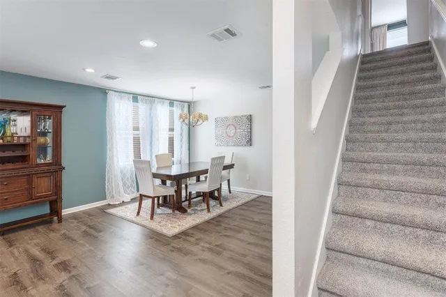 a view of a livingroom with furniture and furniture