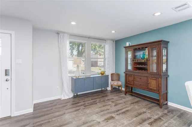 a room with furniture and window