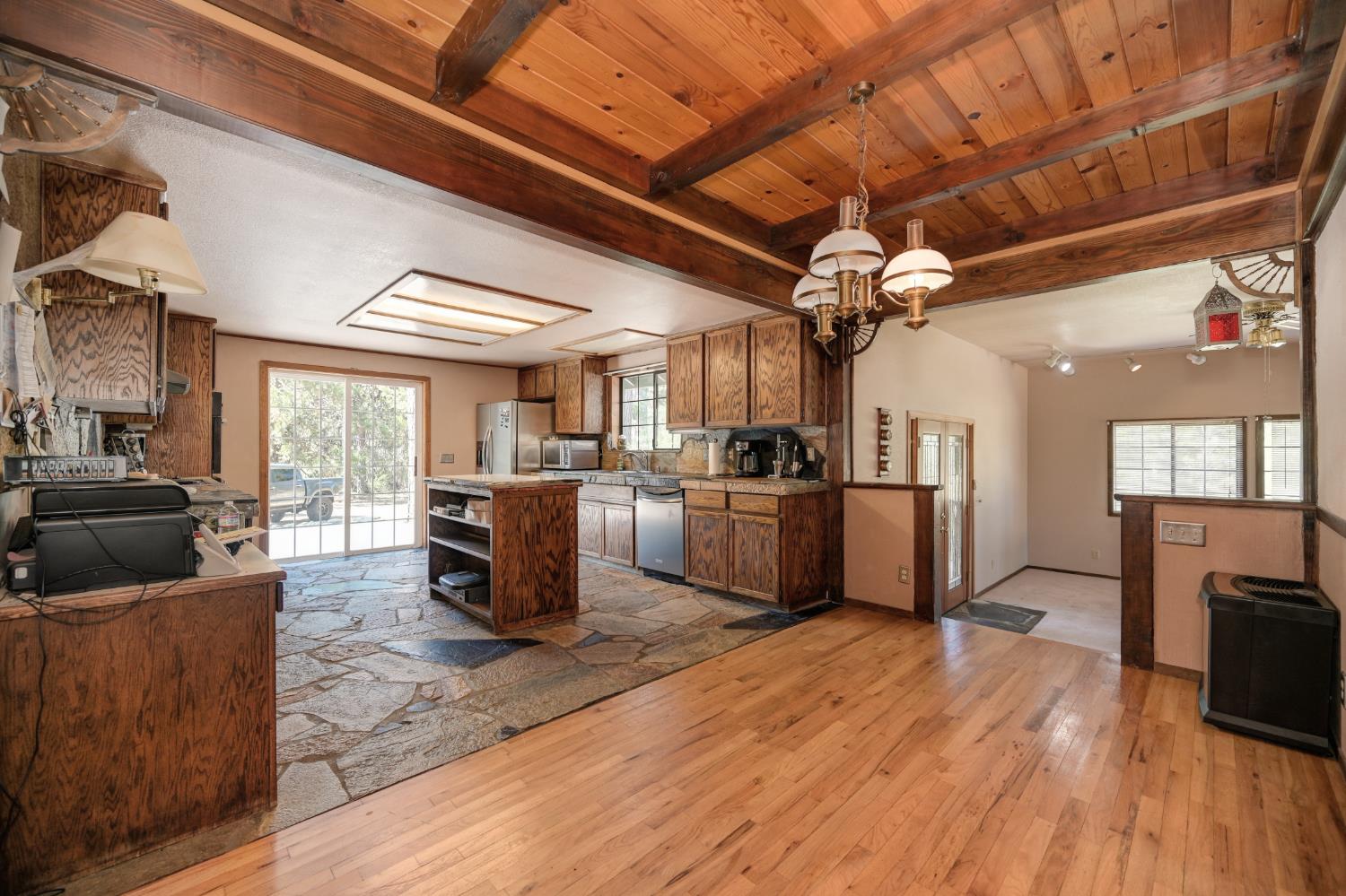 15310 Tyler Foote Road Nevada City, CA 95959 - Photo 14 of 63 a living room with furniture kitchen and a wooden floor