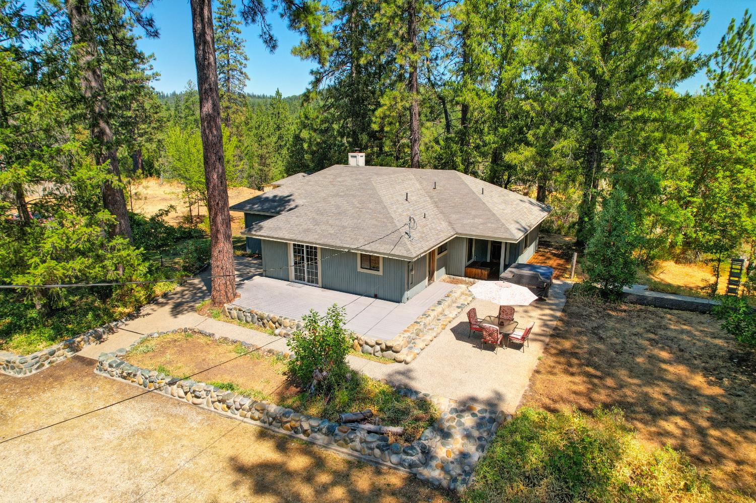 15310 Tyler Foote Road Nevada City, CA 95959 - Photo 2 of 63 a view of a house with a yard