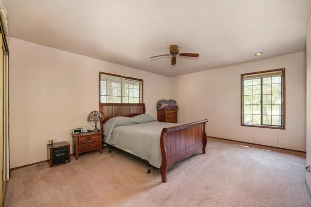 a bathroom with a sink a vanity and a mirror