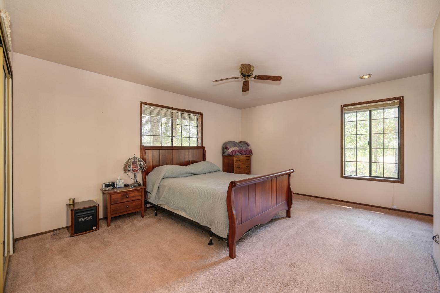15310 Tyler Foote Road Nevada City, CA 95959 - Photo 23 of 63 a bed room with a bed and a window