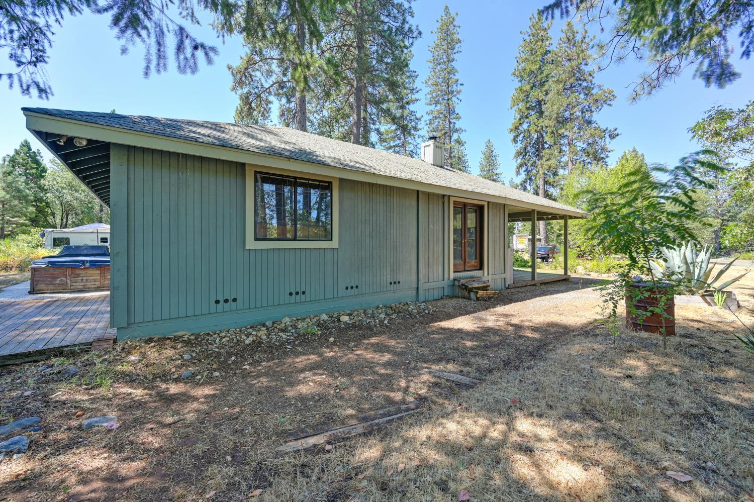 15310 Tyler Foote Road Nevada City, CA 95959 - Photo 36 of 63 a view of a house with a backyard
