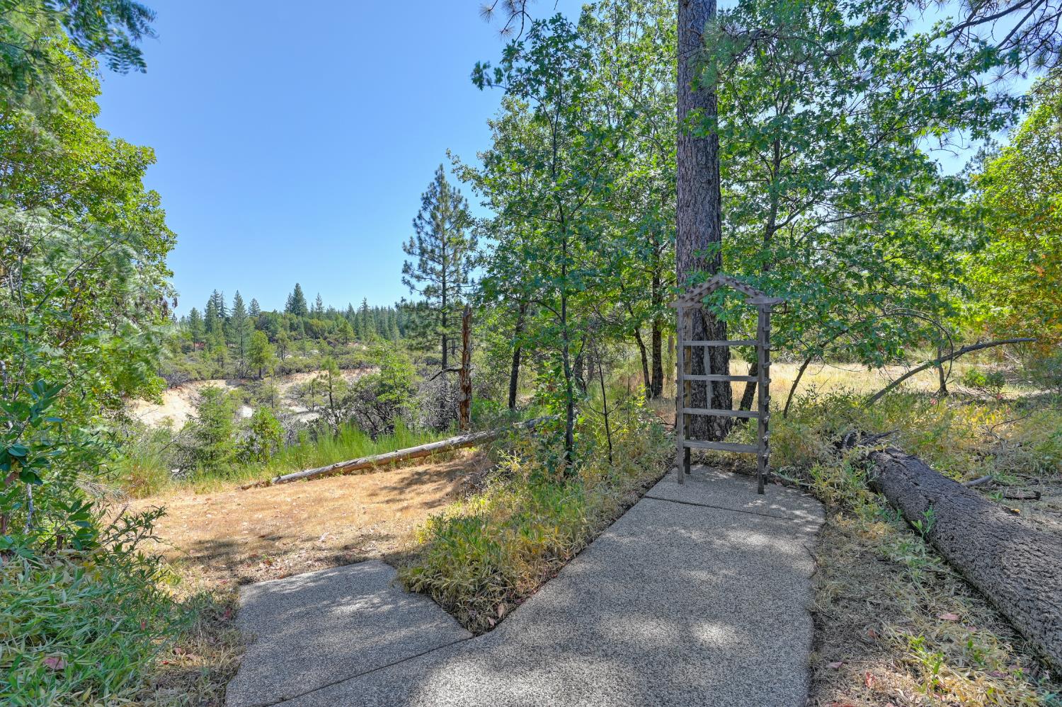 15310 Tyler Foote Road Nevada City, CA 95959 - Photo 39 of 63 a view of a road with a yard