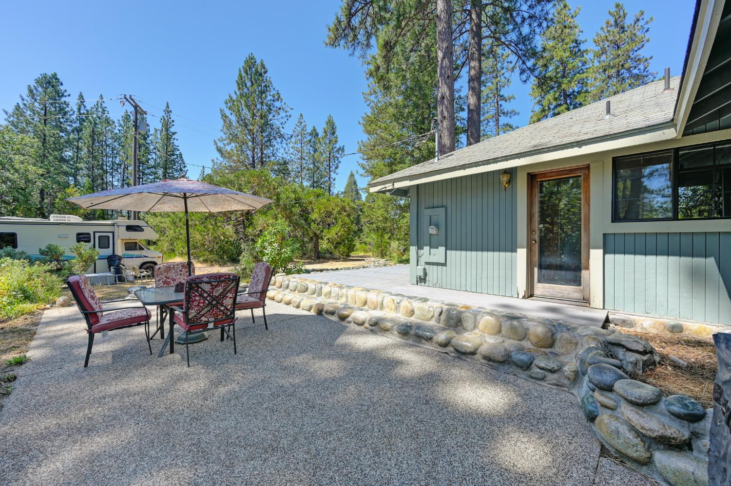 15310 Tyler Foote Road Nevada City, CA 95959 - Photo 40 of 63 a view of a house with backyard and sitting area