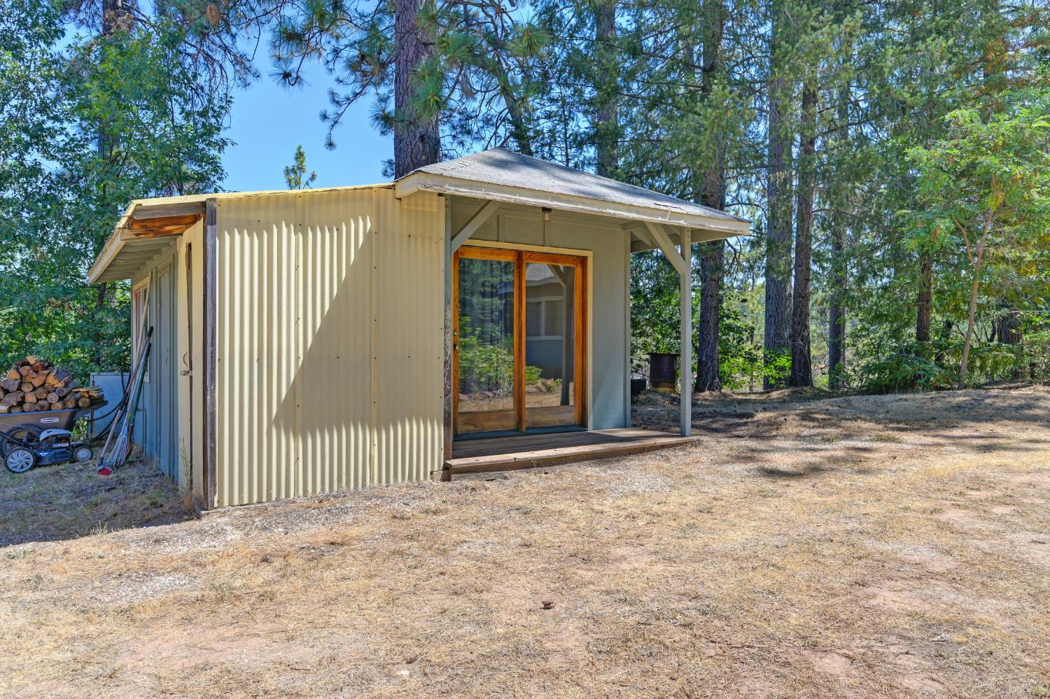 15310 Tyler Foote Road Nevada City, CA 95959 - Photo 47 of 63 a view of a house with backyard and garden