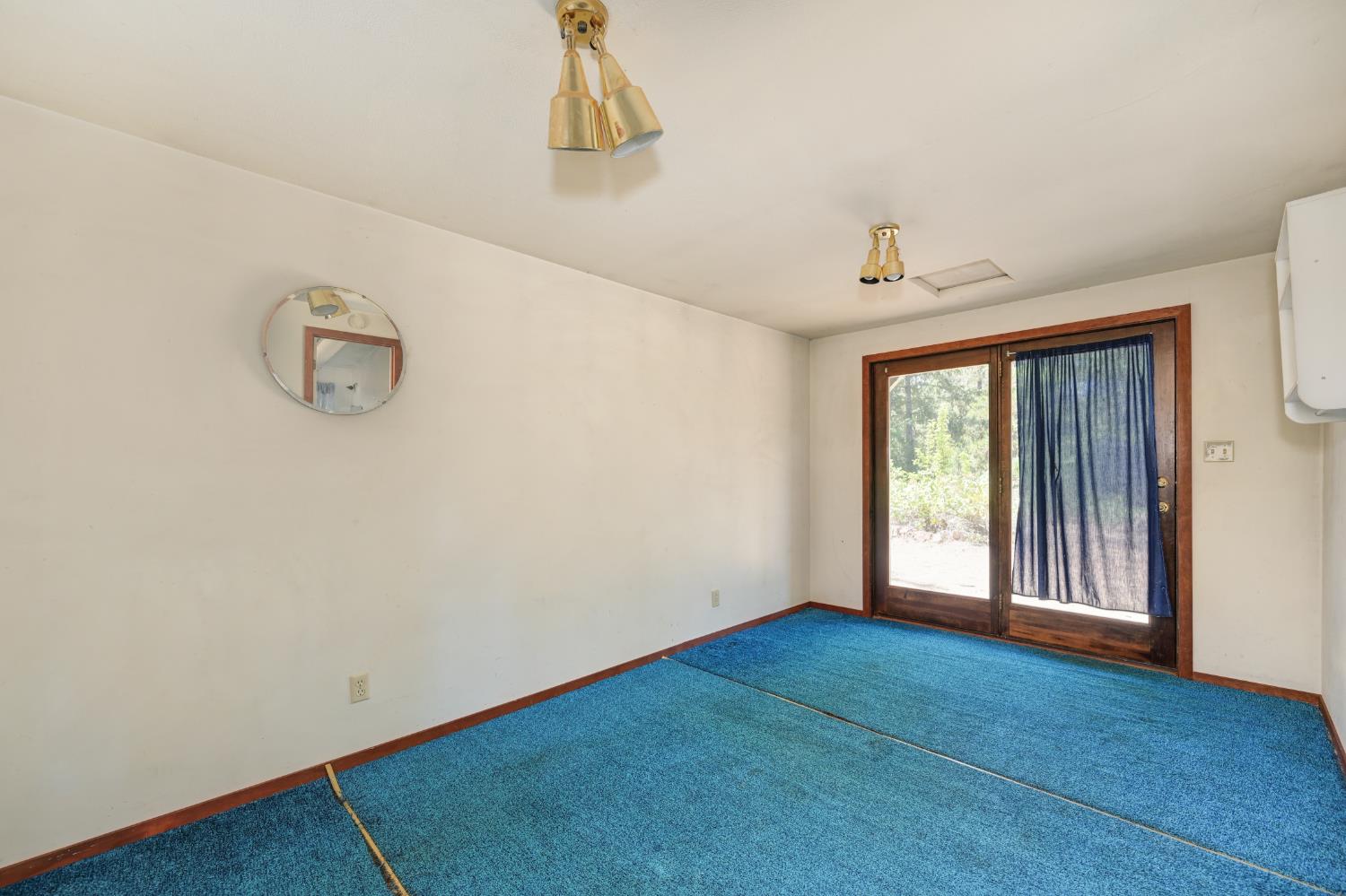 15310 Tyler Foote Road Nevada City, CA 95959 - Photo 51 of 63 a view of room with hardwood floor and cabinet