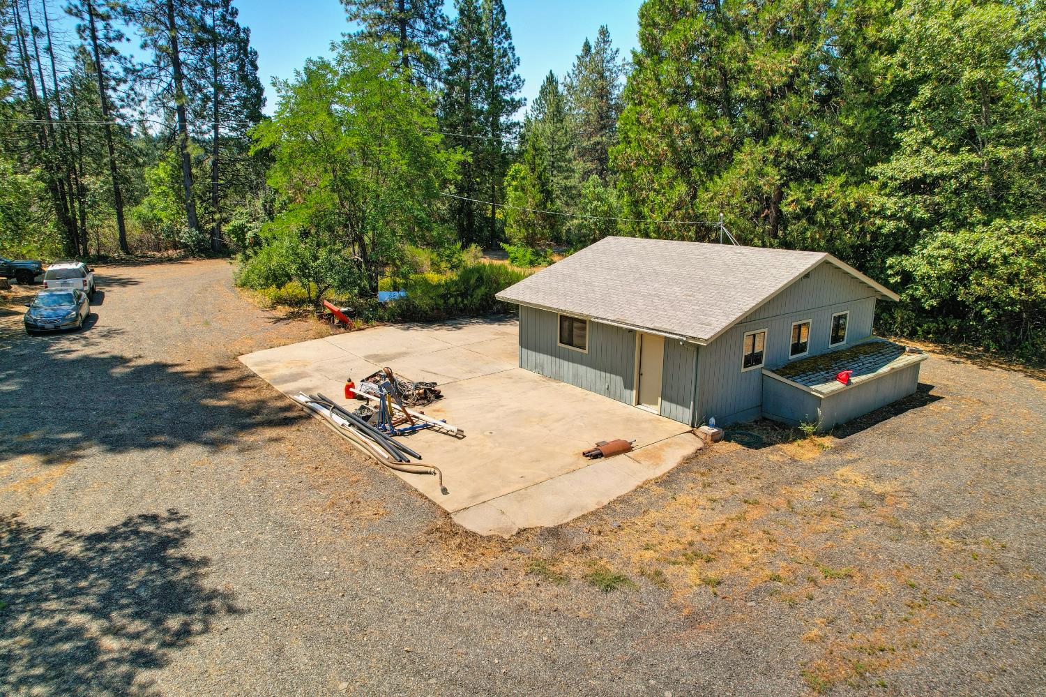 15310 Tyler Foote Road Nevada City, CA 95959 - Photo 58 of 63 an aerial view of a house with yard and trees in the background