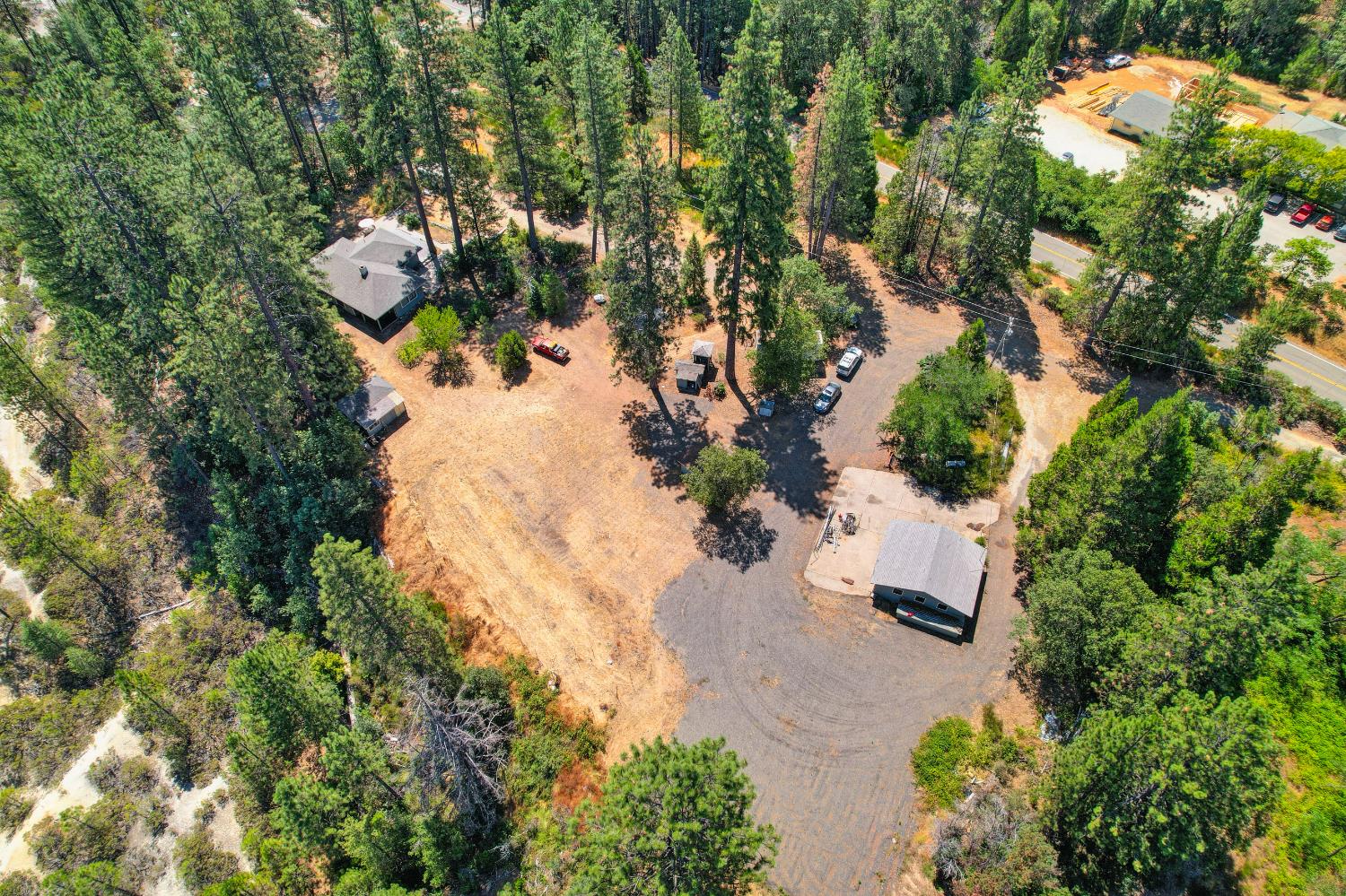 15310 Tyler Foote Road Nevada City, CA 95959 - Photo 61 of 63 an aerial view of a house with a yard and lake view