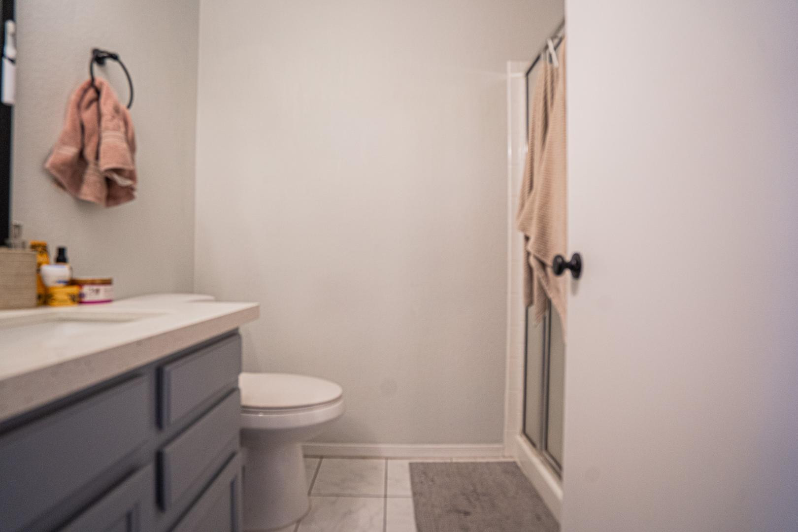 8111 West Wacker Road, Unit 70 Peoria, AZ 85381 - Photo 26 of 38 a bathroom with a sink and toilet