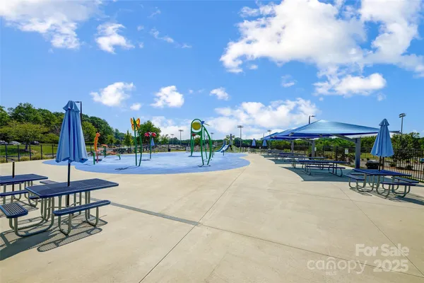 a view of a patio with swimming pool