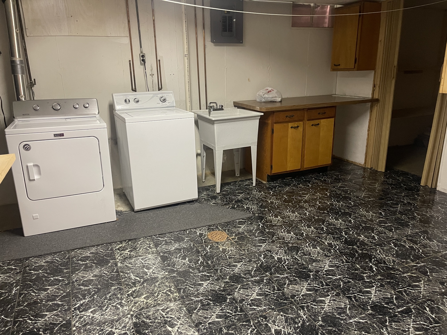 1308 Sunset Drive Peru, IL 61354 - Photo 19 of 19 a utility room with dryer and washer