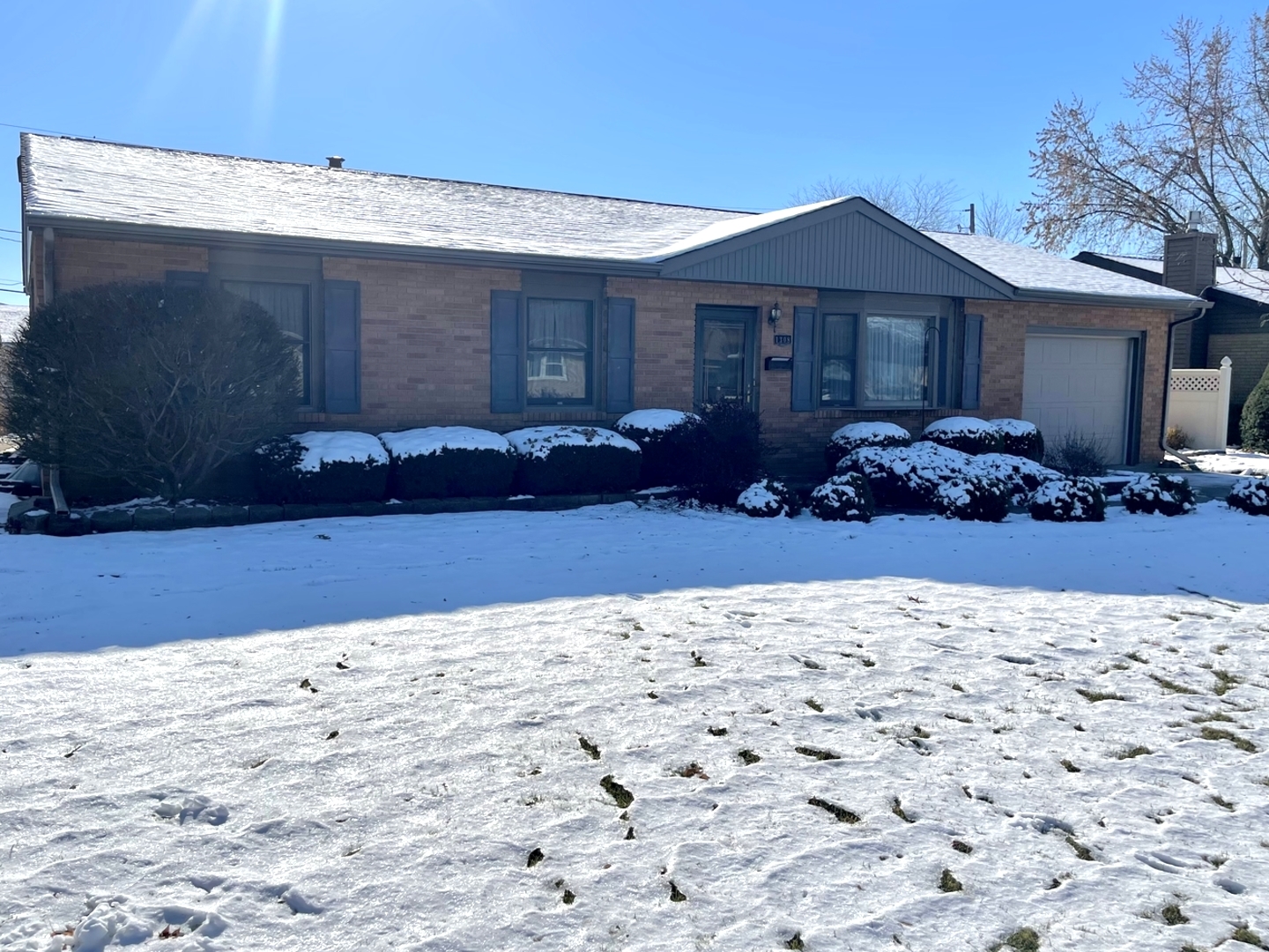 1308 Sunset Drive Peru, IL 61354 - Photo 2 of 19 a front view of a house with a yard