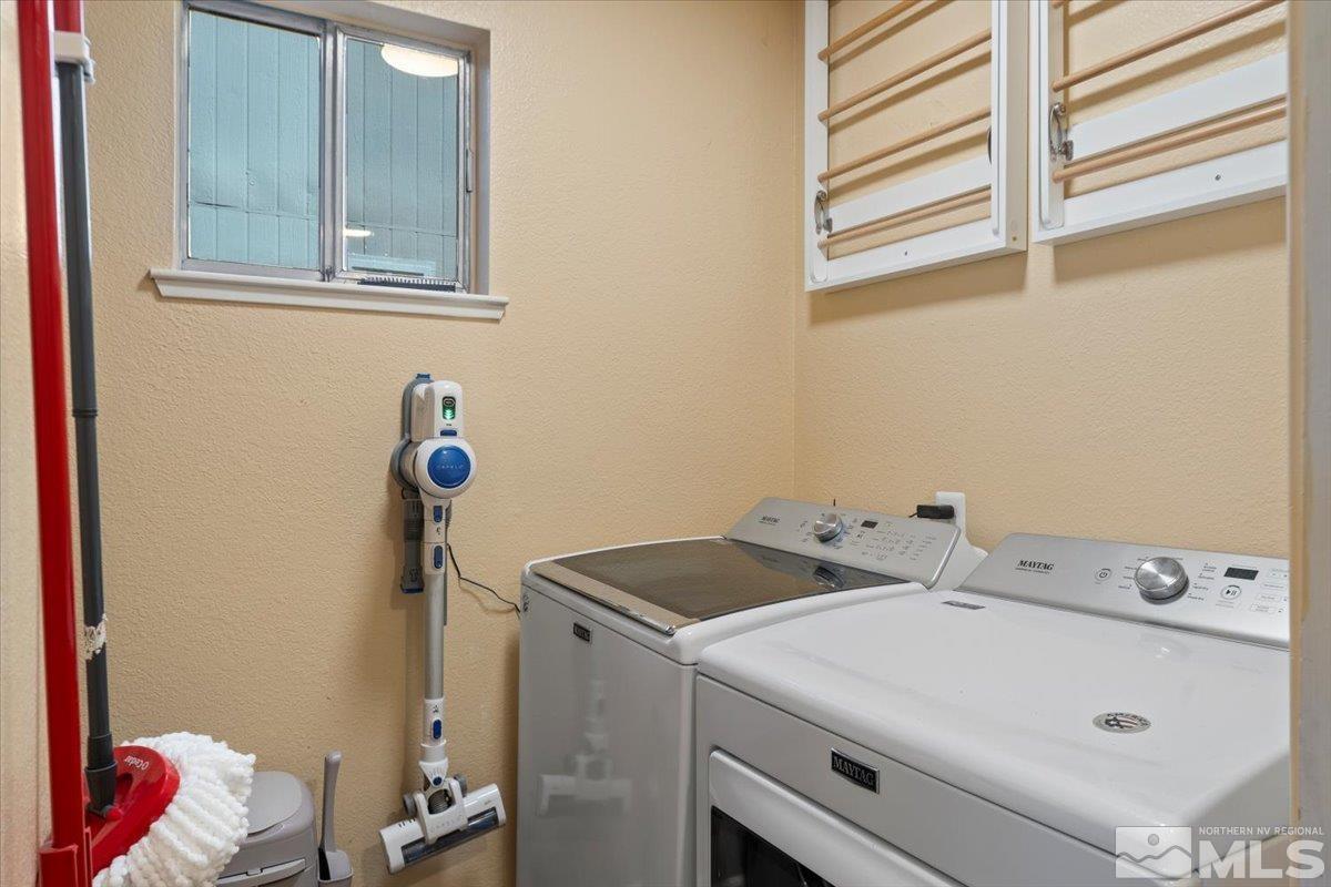 4435 Perro Lane Reno, NV 89502 - Photo 12 of 35 a utility room with dryer and washer