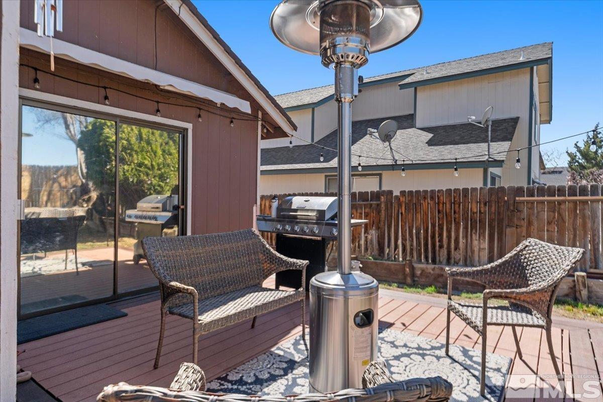 4435 Perro Lane Reno, NV 89502 - Photo 26 of 35 a table and chairs in a balcony