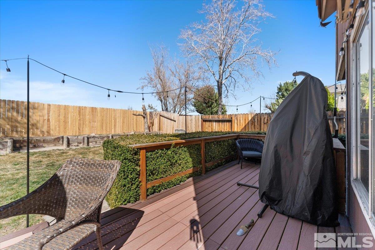 4435 Perro Lane Reno, NV 89502 - Photo 31 of 35 a view of balcony with couch and wooden floor