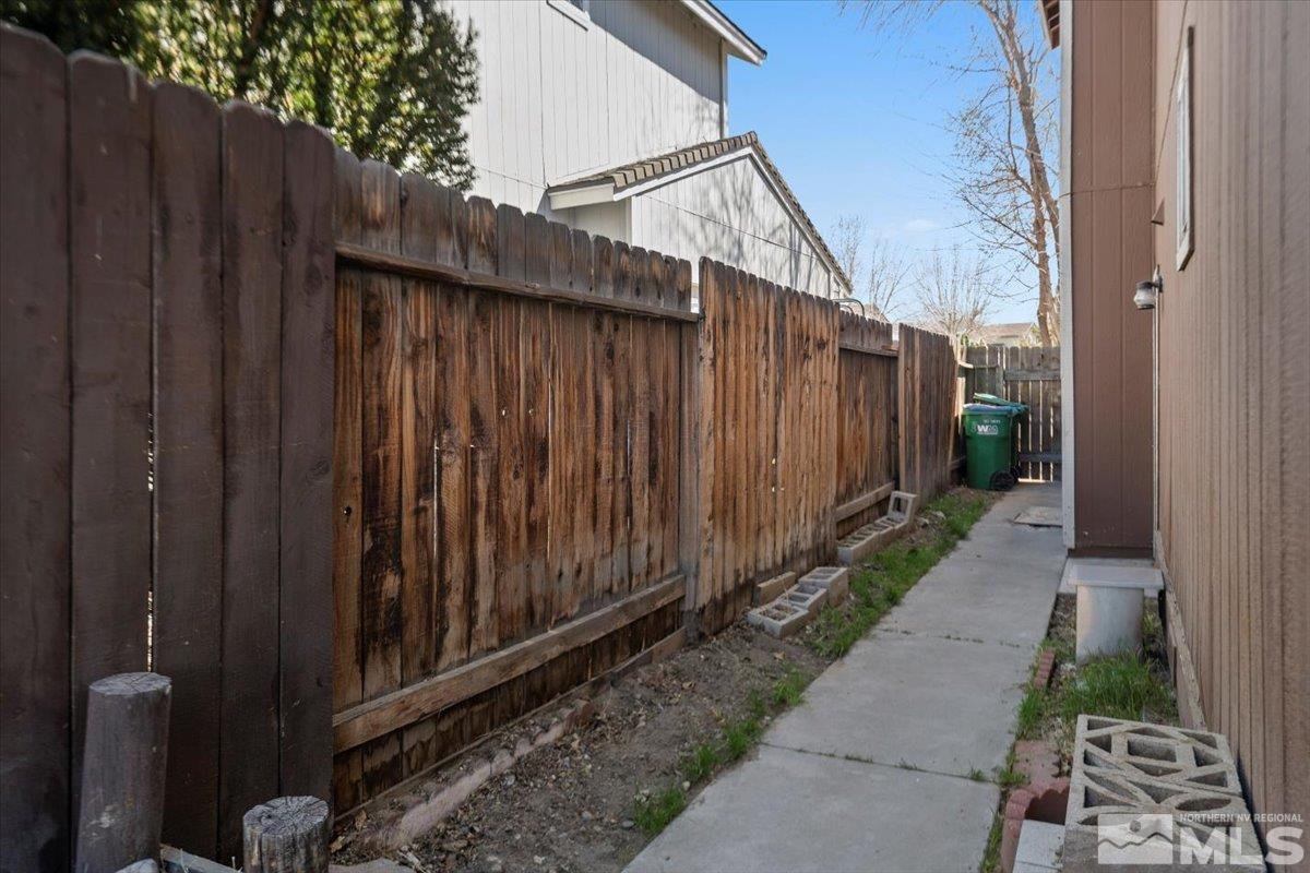 4435 Perro Lane Reno, NV 89502 - Photo 32 of 35 a view of a house with backyard and wooden fence