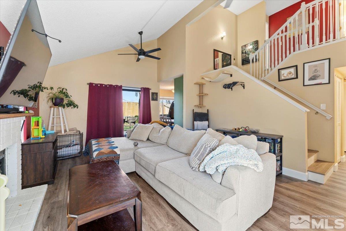 4435 Perro Lane Reno, NV 89502 - Photo 5 of 35 a living room with furniture and a fireplace