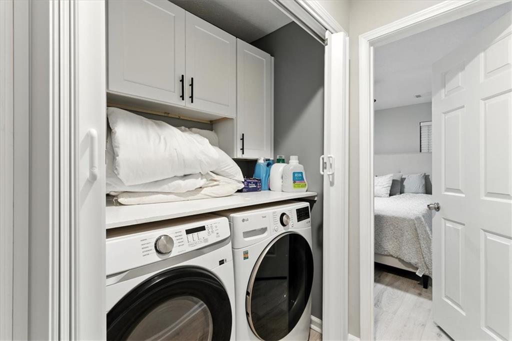 1524 Springleaf Circle Southeast Smyrna, GA 30080 - Photo 16 of 20 a view of washer and dryer in a kitchen