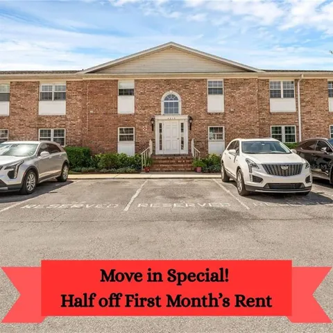 a view of a car parked in front of a building