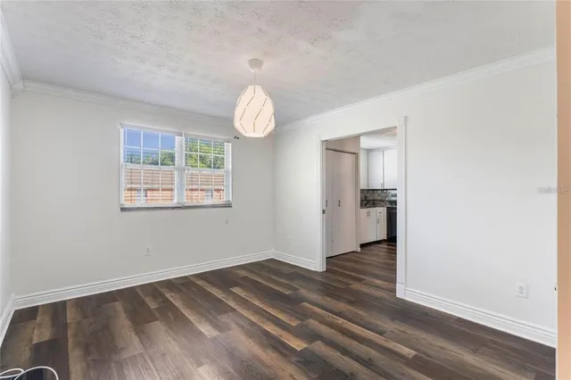 a view of a bathroom from a hallway