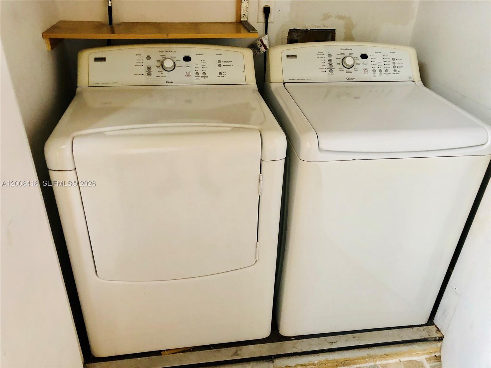 10440 Southwest 156th Court, Unit 712 Miami, FL 33196 - Photo 10 of 10 a utility room with dryer and washer