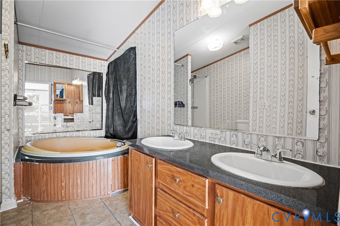 14306 Wilkinson Road Dewitt, VA 23840 - Photo 33 of 60 Dual vanity with undermount sinks and chrome fixtu