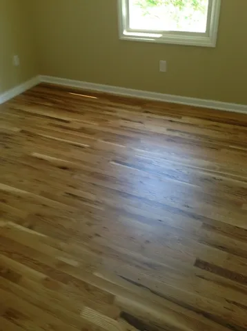 a bathroom with a sink toilet and mirror
