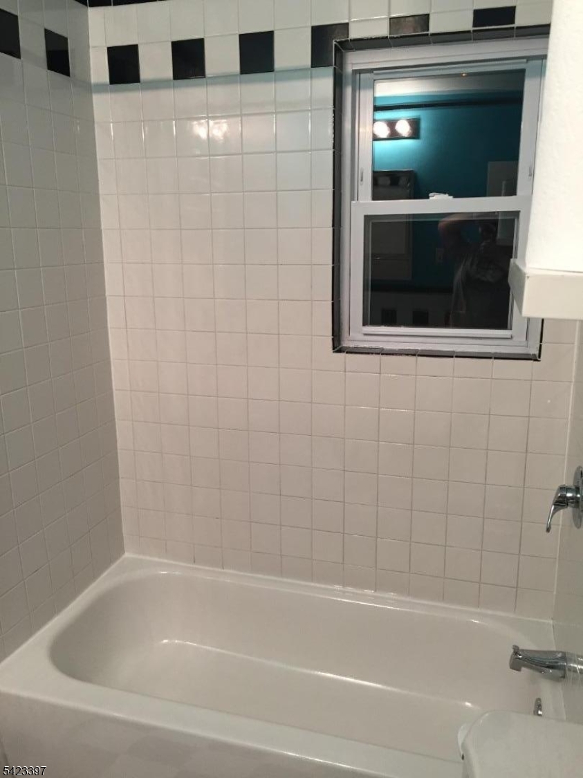 1130 Valley Road, Unit 2B Wayne, NJ 07470 - Photo 11 of 18 a bathroom with a bathtub