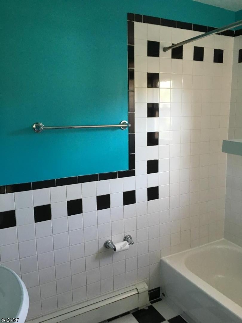 1130 Valley Road, Unit 2B Wayne, NJ 07470 - Photo 13 of 18 a bathroom with a bathtub and shower