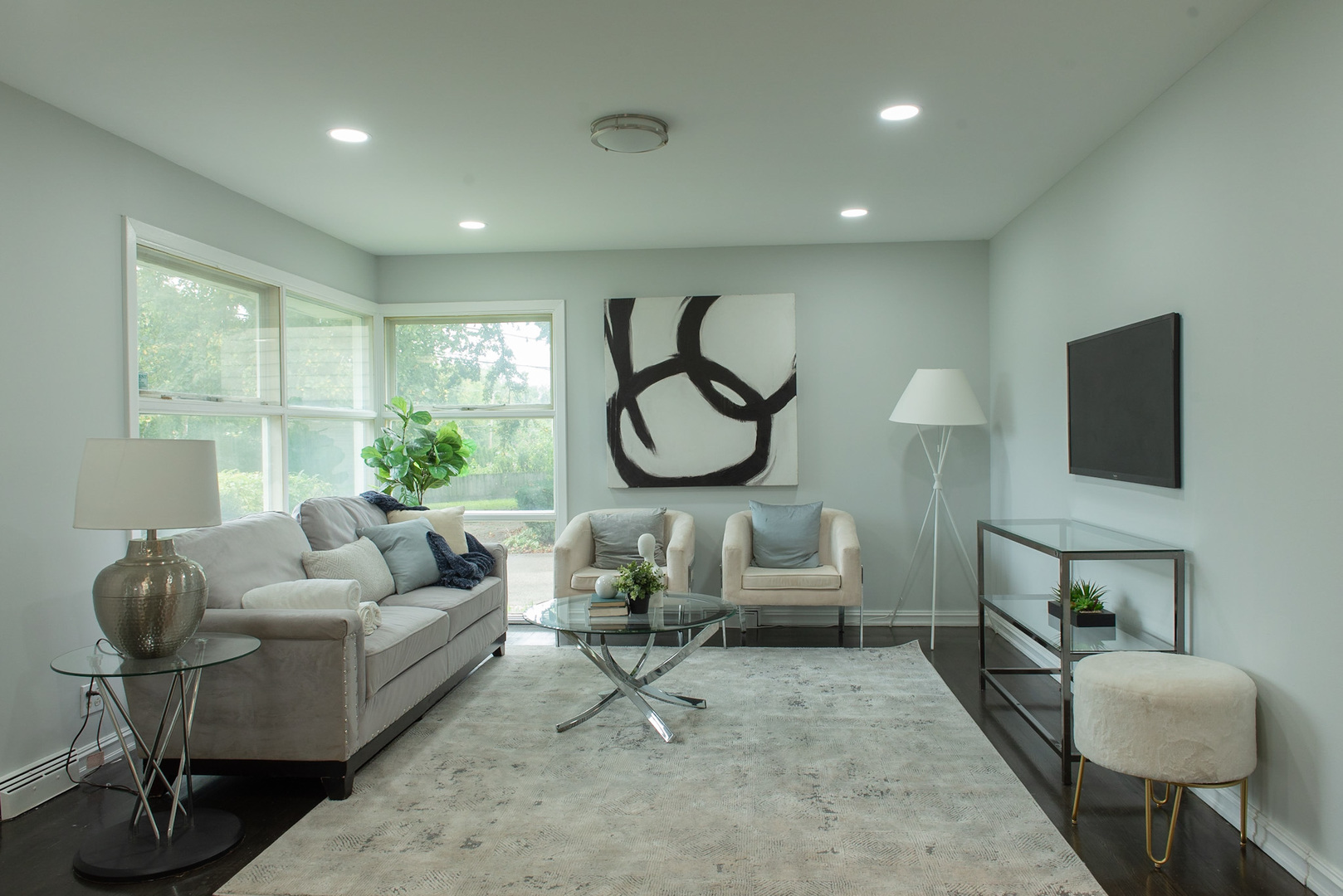 846 Waukegan Road Northbrook, IL 60062 - Photo 5 of 29 a living room with furniture a rug and a large window