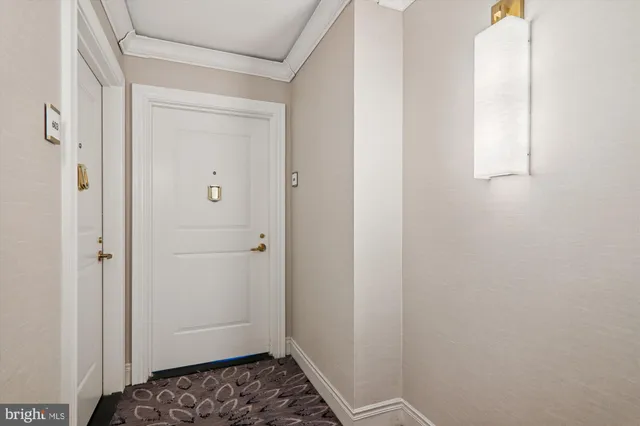 a kitchen with a refrigerator stove and microwave