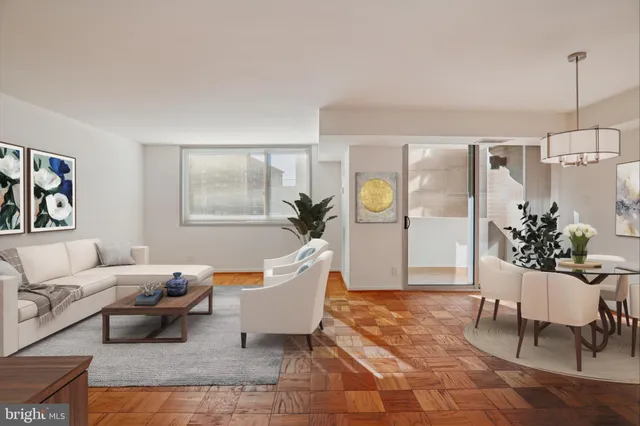 a bedroom with a bed and a potted plant