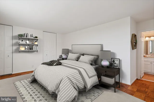 a view of a room with wooden floor