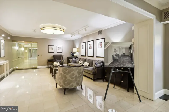 a view of a cafe with a table and chairs under an umbrella