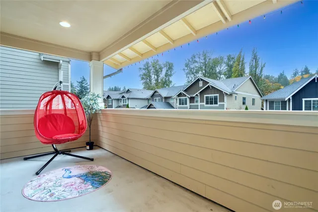a view of a oval kitchen counter space and a wooden floor