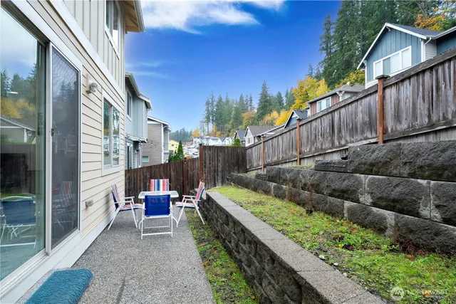 a view of balcony with outdoor seating and stairs